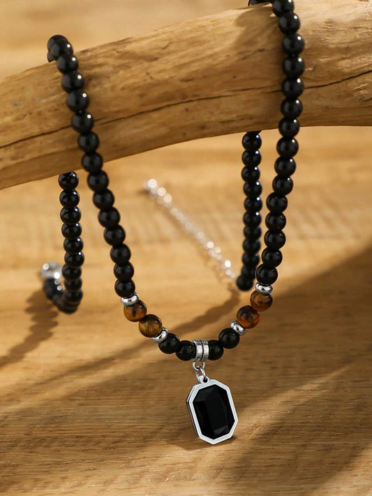 Collar de piedra negra